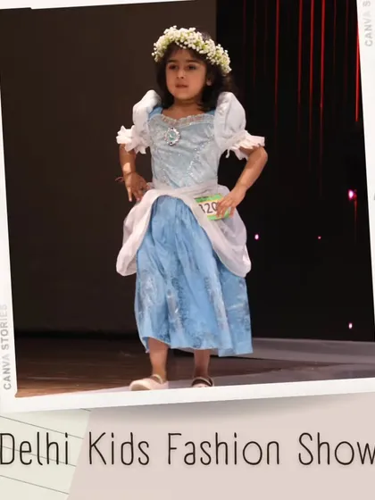 A beautiful fairytale moment with this young model in a blue and white princess dress, complete with a floral crown. My shows are a place for imagination and fun.