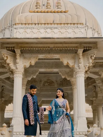 This series of photos at Gaitor Ki Chhatriyan showcases a variety of poses, from intimate close-ups to grand wide shots. I work with each couple to find the angles and compositions that best tell their story against these beautiful marble structures.