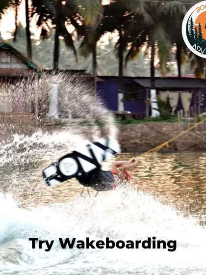 An action shot capturing the spray as a wakeboarder makes a turn. Whether you're trying to land a trick or just enjoying the ride, the experience is packed with adrenaline.