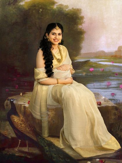 A beautiful maternity portrait with an artistic, painted background. The mother-to-be, in a cream saree, is depicted sitting by a lake with a peacock, mimicking a classic Indian painting.