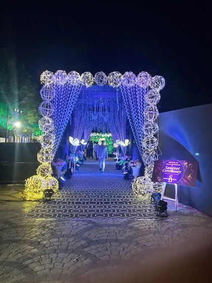 The same Sangeet passage lit in a different color, showing the versatility of the design.