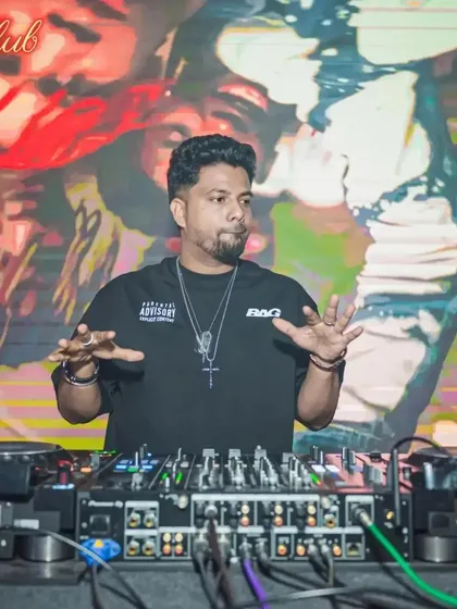 In my element, feeling the music and connecting with the crowd. I don't just stand behind the deck; I interact with the audience and shape the set based on their energy, ensuring the party never stops.