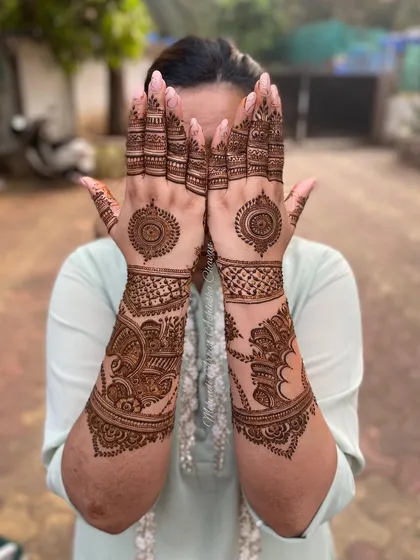 An Indo-Arabic design with a mandala element. The mix of styles creates a unique and beautiful look.