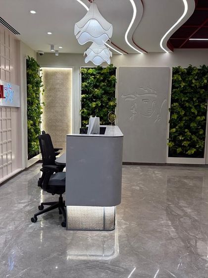 Another view of the Prudential reception, showcasing how the green walls are integrated with architectural lighting. This combination enhances the texture of the foliage and creates a dramatic, high-end feel.