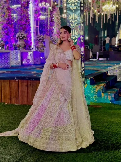 Another angle of my white lehenga look. The purple lighting adds a dramatic effect.