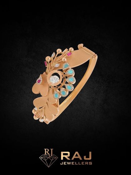 This bracelet is a perfect example of self-expression through jewellery. The unique floral design with turquoise-colored stones and rubies is crafted to complement your individual style and mood.