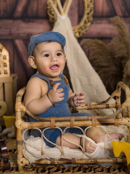 An adorable baby with an innocent, happy smile. These are the precious, fleeting moments I love to capture for families to cherish.