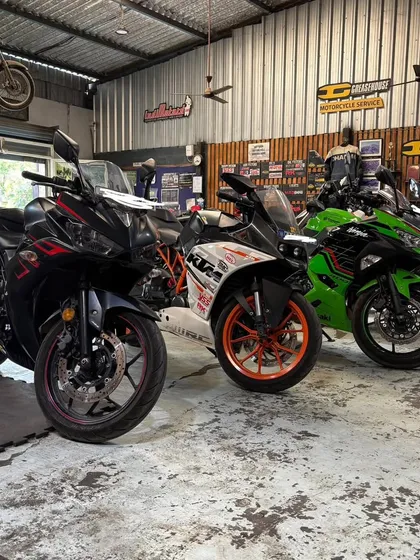 Pick your track day toy. A Yamaha R3, a KTM RC, and a Kawasaki Ninja lined up, representing some of the best entry-level track bikes.