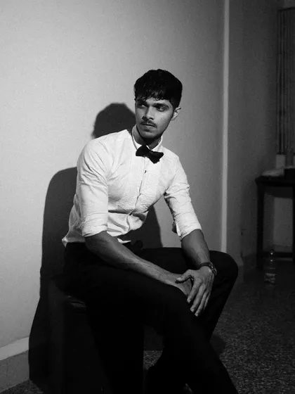 More from the black and white tuxedo series, exploring different poses and lighting angles. I used smoke and shadows to add texture and mood.