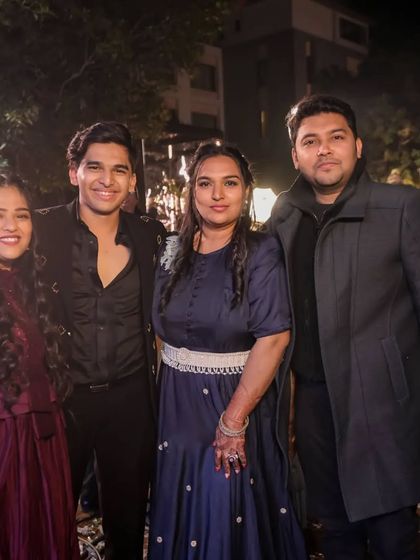 Posing with family during a beautiful sangeet night we choreographed in Pushkar. We become a part of your celebration, wherever it may be.