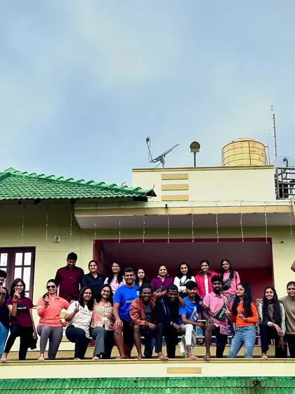 Another angle of our group photo on the homestay roof, capturing the fun and camaraderie of the team.