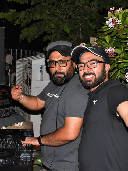 A selfie with my partner DJ Mann'e during a Saturday night gig. We bring a combined energy that makes our duo sets perfect for high-energy clubbing and Bollywood nights.