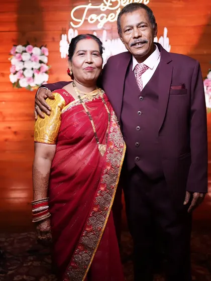 A touching portrait of the bride's parents, looking elegant and happy.
