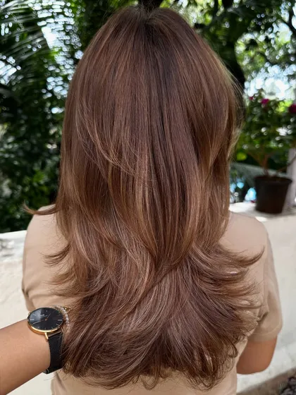 A collection of my hair transformations featuring beautiful warm tones. From caramel to copper, these colors are perfect for adding a sun-kissed glow and dimension.