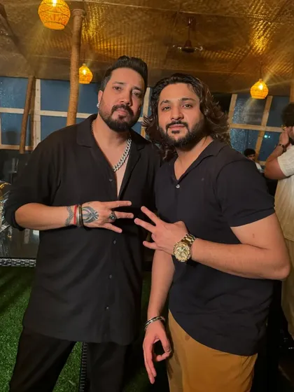 Posing with my guru, Mika Singh ji, during his birthday celebrations.