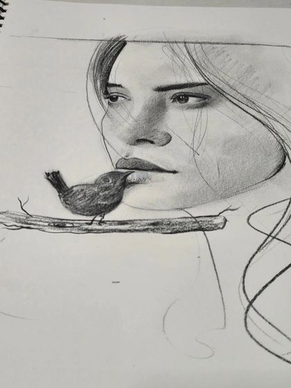 A beautiful pencil sketch in a student's sketchbook, demonstrating the foundational skills of portraiture and shading that we teach in our drawing classes.