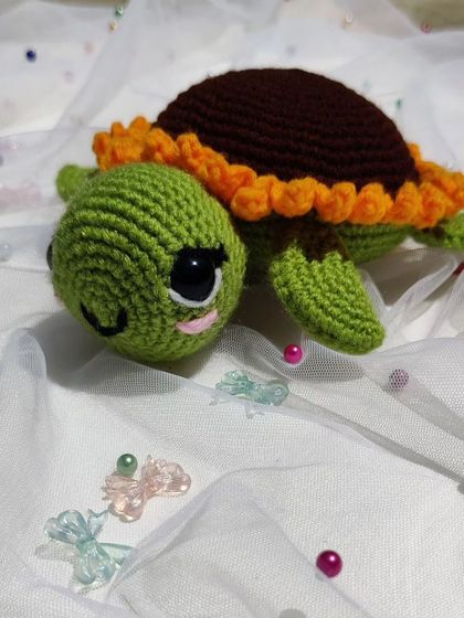 Another angle of the adorable sunflower turtle.