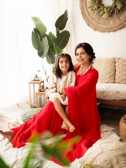 A sweet mother-daughter portrait. They both look so beautiful and happy in our cozy boho studio setup.