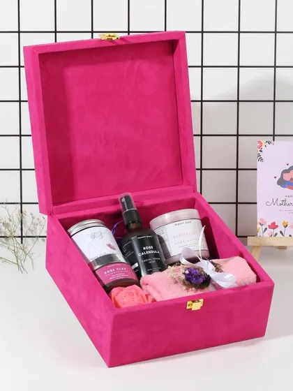 This is my signature pink velvet box, curated for Mother's Day. It's designed to be a complete at-home spa experience, filled with luxurious, handmade rose and calendula products.
