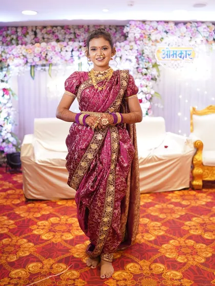 A full-length view of the readymade magenta Peshwai Nauvari. You can see how easy it is to wear, giving you a perfect drape every time.