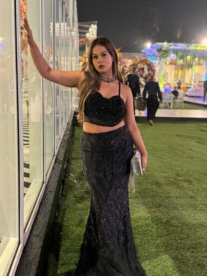 Another look at this gorgeous black gown, perfect for a reception or cocktail party. It's elegant, timeless, and always makes a statement.