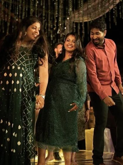 The bride celebrating with her family on the dance floor. These candid moments are just as important as the choreographed ones.