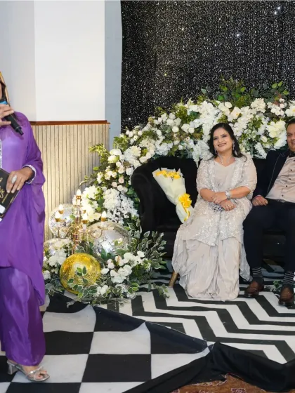 Addressing the guests of honor at their silver jubilee. I always take time to speak with the couple, making them the absolute center of attention.