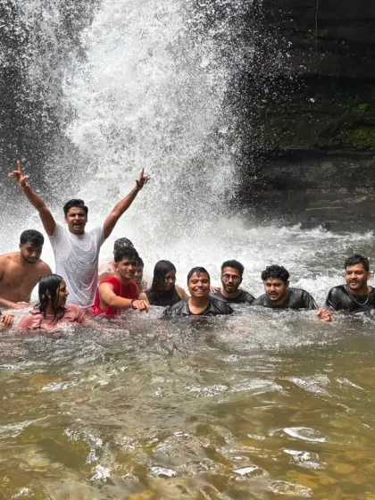 A group shot of my happy trekking batch having a blast in the cool waters of a waterfall near Nethravathi. These moments make the trek unforgettable.