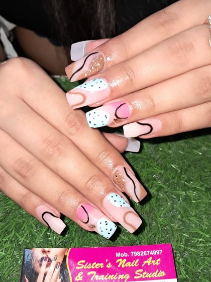 Another angle of the abstract nail art, showing the different details on each nail.