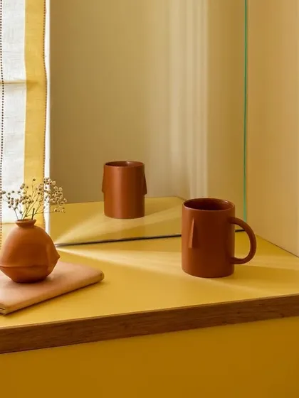 Save if you love yellow. This image captures the warm, summery vibe of the room, proving that monochrome can be both elegant and captivating.