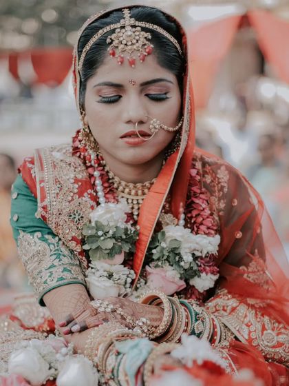 A quiet moment of reflection for the bride during the ceremony. These introspective shots add a deep emotional layer to your wedding album.