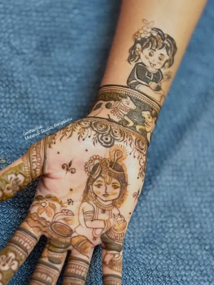 A unique baby shower design featuring a portrait of the couple's older child on the wrist, welcoming her new sibling.