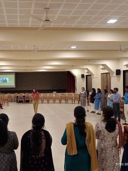 Another view of an interactive training exercise with educators. My goal is to model the exact kind of environment I encourage them to create: one of movement, expression, and collaborative fun.