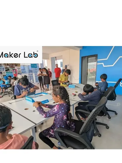 The lab is buzzing with activity as students work on their projects. This image captures the focused energy of a typical workshop session.