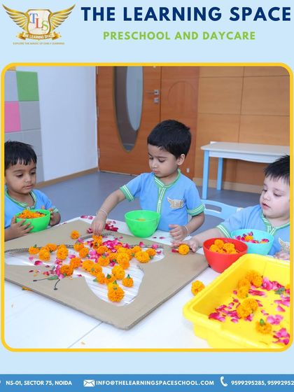 Children work together to create a map of India using flower petals. This is a beautiful example of how we integrate cultural learning with hands-on, sensory art.