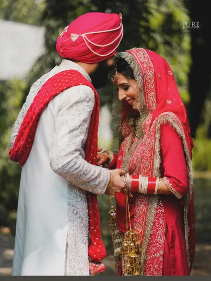 A tender forehead kiss, a simple gesture of love and protection. We look for these small, meaningful moments that tell a big story.