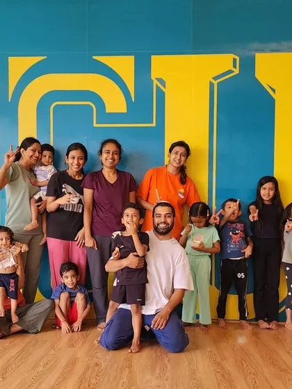A happy group photo from our International Yoga Day celebration. We bring dance and yoga together, creating a community that moves with purpose and joy.