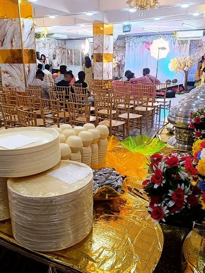 A view from the catering corner during an event. We ensure everything is stocked and ready, from plates to flowers, so the service runs smoothly.