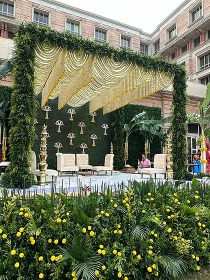 The mandap set in the courtyard of the ITC Maratha, surrounded by lush marigold plantings.