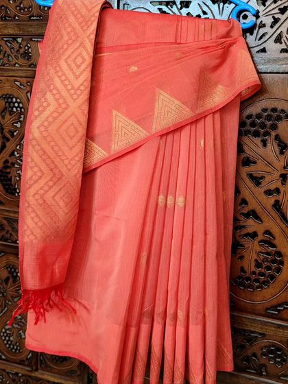 Another example of hanger folding, which keeps the saree ready to wear and minimizes wrinkles.