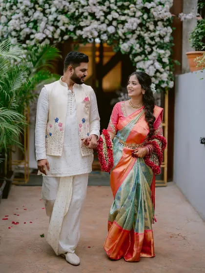 Walking hand in hand, Gayatri and Saurabh step forward into their new life together. This shot captures the movement and anticipation of their engagement day.