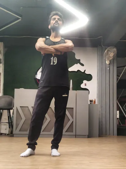 A standing pose from my own practice. This demonstrates the stability and grounding that comes from a consistent yoga routine.