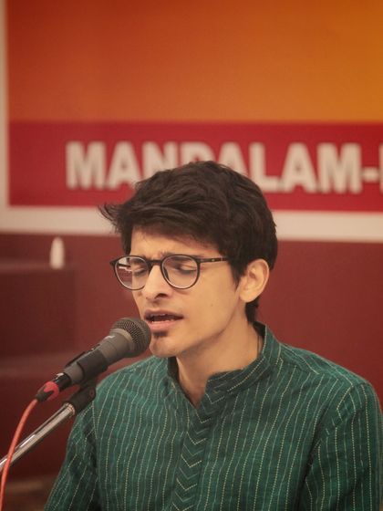 The passion and emotion are evident as this student performs at the 'Swarveni Aradhana'.