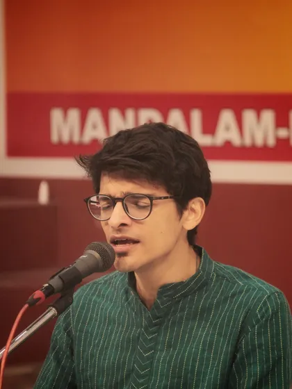 A close-up of a student performing, capturing his dedication and the emotion he pours into his singing.