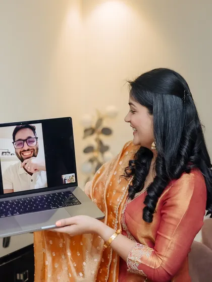 A modern Roka, with the groom joining the celebration via video call, a testament to love across distances.