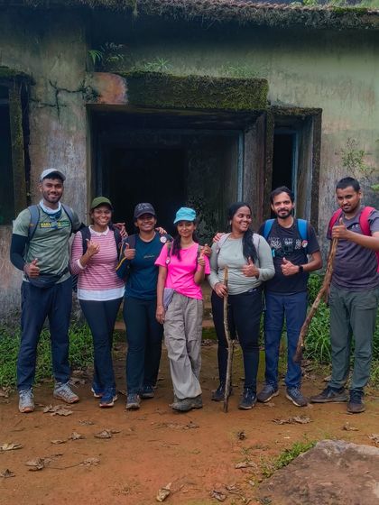 Our group at an old, abandoned building on the Kurinjal trail, a remnant of the area's mining history.