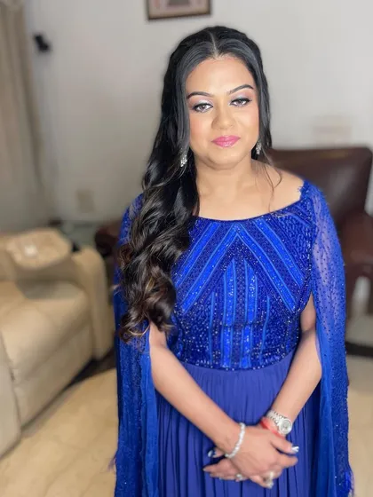 Another angle of this lovely party look. The makeup is fresh and radiant, perfect for dancing the night away.