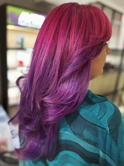 The back view of the pink and violet hair, showing the beautiful melt between the two vivid colors.