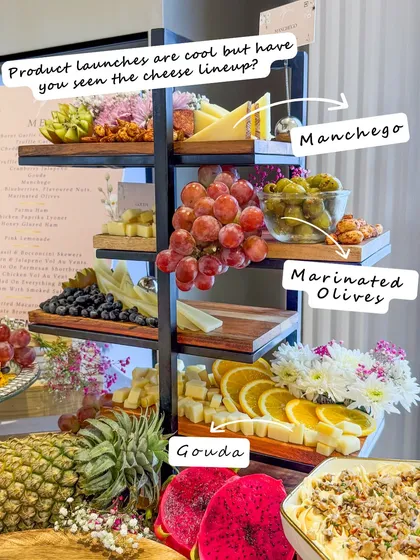 Product launches are cool, but have you seen the cheese lineup? Our multi-tiered cheese tower at the Bioderma event featured Manchego, Gouda, and marinated olives.