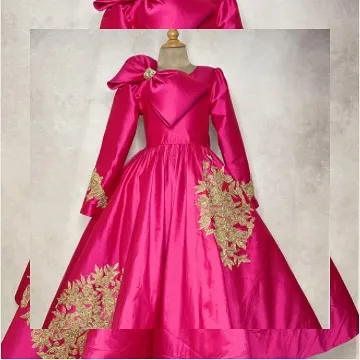 A full front view of the magenta gown, highlighting the elegant silhouette and the beautiful sheen of the silk fabric.